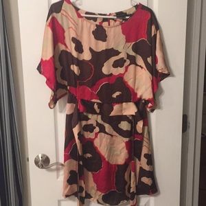 Fun silk dress- big sleeves & flattering bottom.